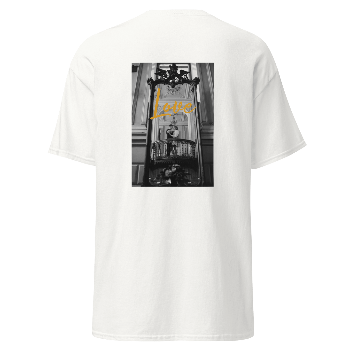 White unisex T-shirt showcasing the word 'LOVE' in bold, elegant typography on the back. The design adds a touch of sophistication to the minimalist style.